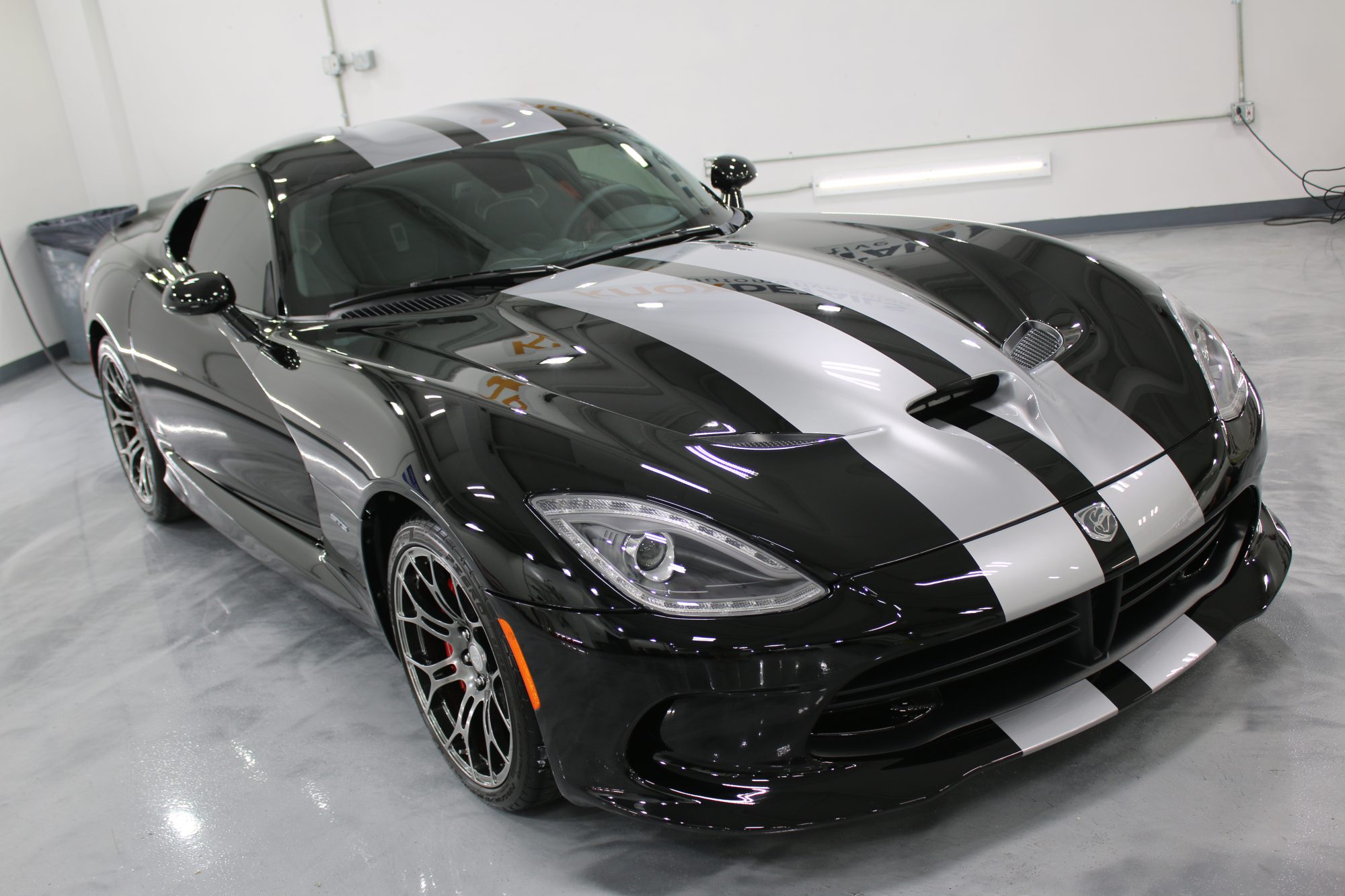 IMG_6349 a black dodge viper with white racing stripes, paint protection film, and ceramic tint