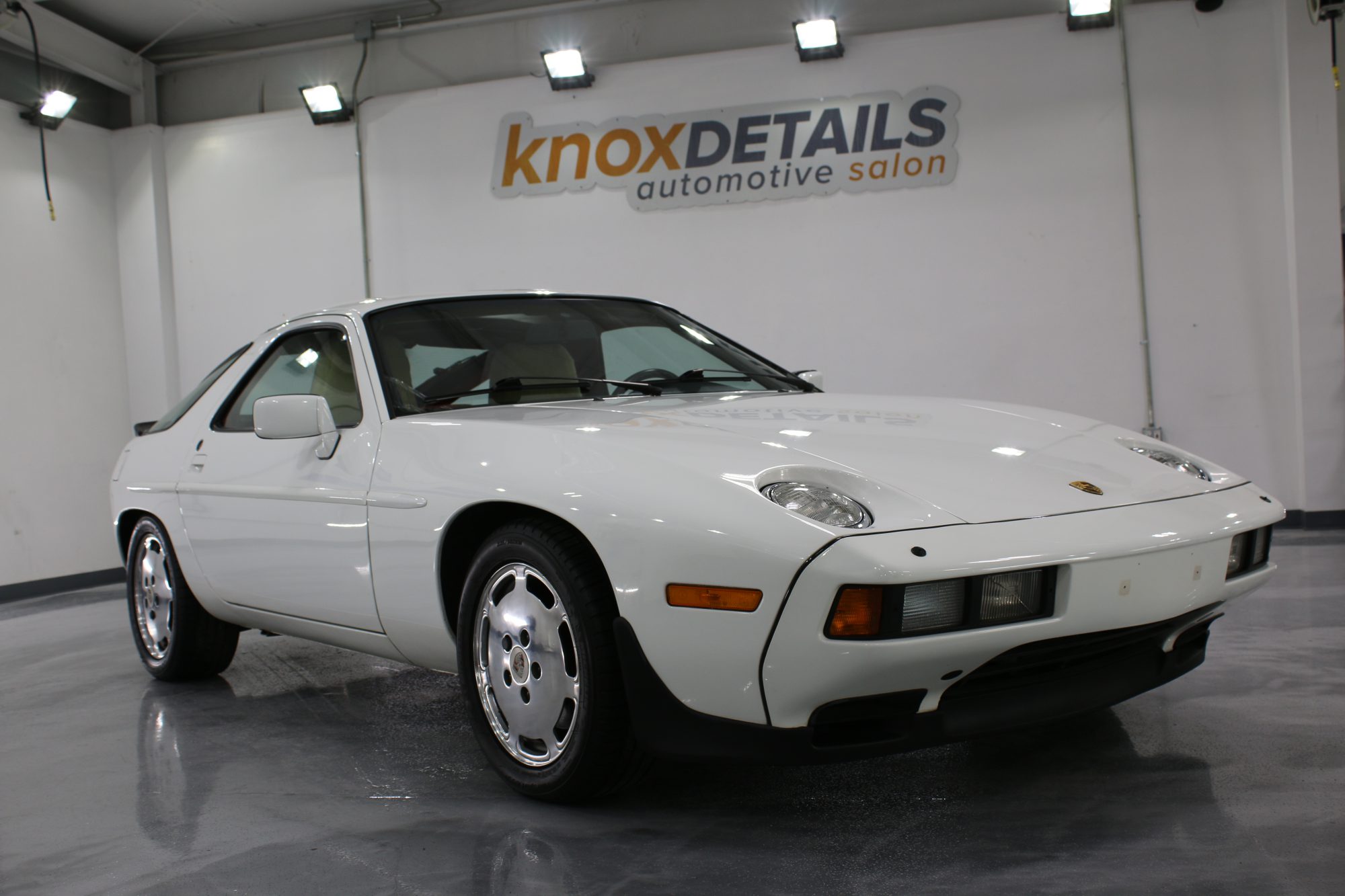 a white Porsche 928with paint protection film at Knox Details