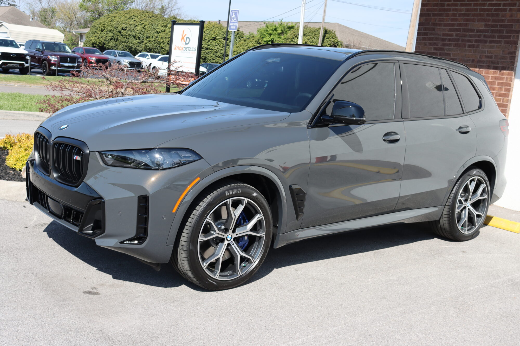 IMG_5677 a BMW X5 with PPF and Ceramic Window Tint parked in front of Knox Details